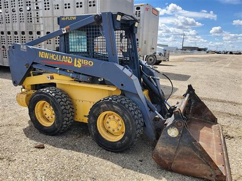 new holland 200 series skid steer price|used new holland ls180 for sale.